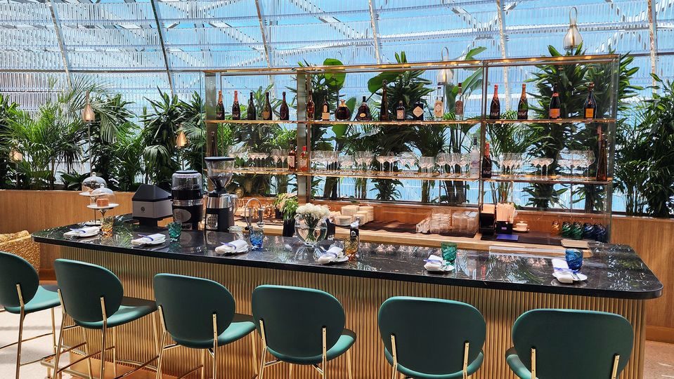 The bar features Champagnes from the LVMH family, including Veuve Clicquot and Dom Perignon.