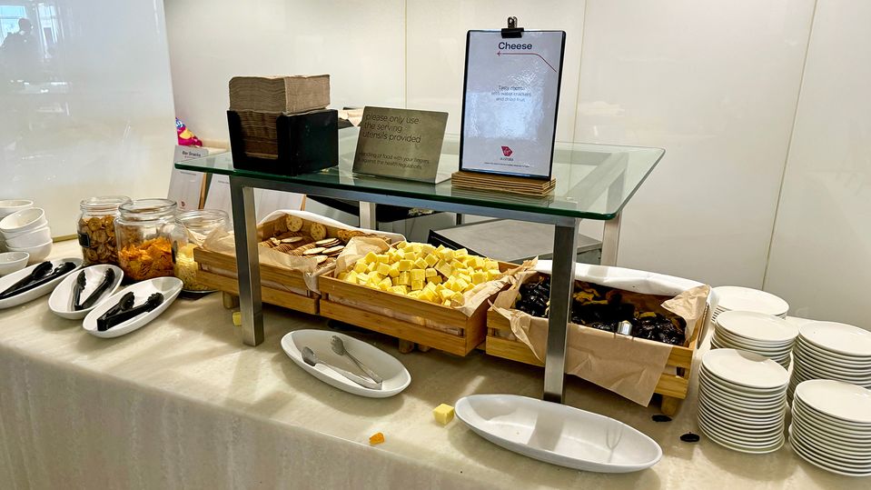 Water crackers, dried fruit and cubes of tasty cheese.